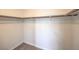 Walk-in closet features shelving and carpeting at 9626 Grapeland Ave, Las Vegas, NV 89148