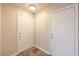 Entryway features tile floors, white doors, and neutral colored walls at 9626 Grapeland Ave, Las Vegas, NV 89148