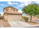 Charming two-story home with a large garage and landscaped front yard, tile roof, and beautiful mature landscaping at 9626 Grapeland Ave, Las Vegas, NV 89148
