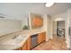 A kitchen area features a stainless steel sink and access to a laundry room at 9626 Grapeland Ave, Las Vegas, NV 89148