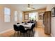 Bright dining room with hardwood floors, modern decor, and a large window at 98 Milicity Rd, Henderson, NV 89012