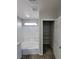 Bathroom featuring a tub, shower, and walk-in closet at 10449 Forked Run St, Las Vegas, NV 89178