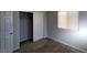 This bedroom has neutral paint and carpet with closet and window for natural light at 10449 Forked Run St, Las Vegas, NV 89178