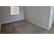 A bedroom features neutral-colored walls and carpeted floors at 10449 Forked Run St, Las Vegas, NV 89178