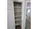 Walk-in closet with adjustable shelving for optimal storage and organization at 10449 Forked Run St, Las Vegas, NV 89178
