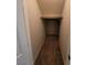 A walk-in closet features a shelf and neutral-colored walls at 10449 Forked Run St, Las Vegas, NV 89178