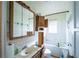 Bathroom features a tub, mirror, sink, and cabinets at 1213 New Mexico St, Boulder City, NV 89005