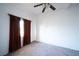 Bedroom with neutral walls and natural light from the window, ready for personal touches at 1213 New Mexico St, Boulder City, NV 89005