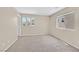 Inviting bedroom with soft carpet, multiple windows bringing in natural light, and neutral paint at 1557 Sabatini Dr, Henderson, NV 89052