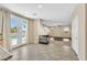 Bright and airy space with large windows, a fireplace, and access to the backyard pool area at 1557 Sabatini Dr, Henderson, NV 89052