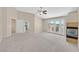 Bright main bedroom with a fireplace, access to deck and neutral decor at 1557 Sabatini Dr, Henderson, NV 89052