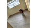 A bright room with hardwood floors and a window at 1936 Lawry Ave, North Las Vegas, NV 89032