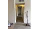 Hallway with hardwood floors and white walls, leading to a bright room at 1936 Lawry Ave, North Las Vegas, NV 89032