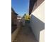 Side yard features a block fence and gate for added security and privacy at 1936 Lawry Ave, North Las Vegas, NV 89032