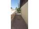 Side yard features a block fence and gate for added security and privacy at 1936 Lawry Ave, North Las Vegas, NV 89032