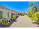 Landscaped backyard features gravel, healthy plants, and desert-style landscaping at 2131 Sandstone Cliffs Dr, Henderson, NV 89044