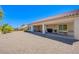 Expansive backyard with a covered patio perfect for outdoor grilling and relaxation at 2131 Sandstone Cliffs Dr, Henderson, NV 89044