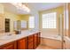 Primary bathroom with separate shower, tub, and dual sink vanity at 2131 Sandstone Cliffs Dr, Henderson, NV 89044