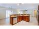 Kitchen area showcasing stainless steel appliances, granite countertops and a large sink at 2131 Sandstone Cliffs Dr, Henderson, NV 89044