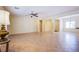 Open-concept living room features neutral walls and tile flooring throughout at 2131 Sandstone Cliffs Dr, Henderson, NV 89044