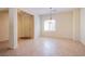 Open-concept living space with tile flooring and front door view at 2131 Sandstone Cliffs Dr, Henderson, NV 89044