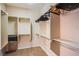 Walk-in closet with shelving and hanging rods for maximum storage at 2131 Sandstone Cliffs Dr, Henderson, NV 89044