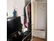 Bedroom featuring tile floor, closet, and dresser with television at 2315 Perliter Ave, North Las Vegas, NV 89030