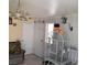 The living room has a cage and some places to sit at 2315 Perliter Ave, North Las Vegas, NV 89030