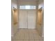 Inviting entryway featuring double doors, tiled flooring, and decorative alcoves with granite counters at 2524 Banora Point Dr, Las Vegas, NV 89134
