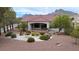 Charming home featuring desert landscaping, covered patio, and lovely outdoor seating area at 2524 Banora Point Dr, Las Vegas, NV 89134