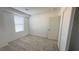 Cozy carpeted bedroom with closet, neutral walls, and natural light at 2713 Abrantes Pl, Henderson, NV 89044