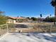 Backyard view with fence, offering potential for landscaping and personalization at 2784 Belcastro St, Las Vegas, NV 89117