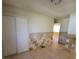 Bedroom with sliding door closet and tiled accent wall for a unique design at 2784 Belcastro St, Las Vegas, NV 89117
