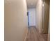 Hallway with wood floors and neutral walls at 2784 Belcastro St, Las Vegas, NV 89117
