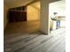 Open-concept living area connecting to the kitchen, featuring durable flooring at 2784 Belcastro St, Las Vegas, NV 89117