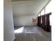 Bright living room featuring new laminate floors, high ceilings, and multiple large windows at 2784 Belcastro St, Las Vegas, NV 89117