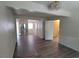 Open-concept living room features new gray flooring, modern light fixture, and easy access at 2784 Belcastro St, Las Vegas, NV 89117