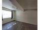 Spacious living room with wood floors, a window and natural light at 2784 Belcastro St, Las Vegas, NV 89117