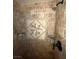 Shower with brown brick walls and mosaic tile at 2784 Belcastro St, Las Vegas, NV 89117