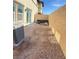 Blank canvas backyard space ready for landscaping or your own personal touches at 302 Bay Village Pl, Henderson, NV 89011