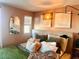 Comfortable bedroom with natural light, stylish decor, and a cozy bed with many pillows at 302 Bay Village Pl, Henderson, NV 89011