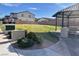 Enjoyable common area with seating, green lawn, and shade that create a welcoming community space at 302 Bay Village Pl, Henderson, NV 89011
