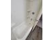 Clean bathtub with white finish and updated fixtures in a bathroom setting at 3412 Townhouse Dr, Las Vegas, NV 89121