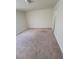 A bedroom with carpeted flooring and a large window allowing for plenty of natural light at 3412 Townhouse Dr, Las Vegas, NV 89121