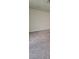 Cozy carpeted bedroom with ample space and natural light, ideal for a peaceful rest at 3412 Townhouse Dr, Las Vegas, NV 89121