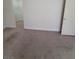 Inviting carpeted bedroom featuring access to a closet, blending comfort with practicality at 3412 Townhouse Dr, Las Vegas, NV 89121
