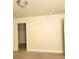A simple bedroom featuring neutral walls, carpet, and a closet at 3412 Townhouse Dr, Las Vegas, NV 89121