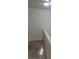 Hallway featuring neutral paint and carpet with a railing on the right side at 3412 Townhouse Dr, Las Vegas, NV 89121