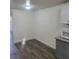 Well-lit kitchen featuring gray counters, gray lower cabinets, and white upper cabinets at 3412 Townhouse Dr, Las Vegas, NV 89121
