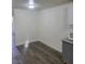 Clean kitchenette area showcasing gray cabinets, granite countertops, and stainless microwave at 3412 Townhouse Dr, Las Vegas, NV 89121